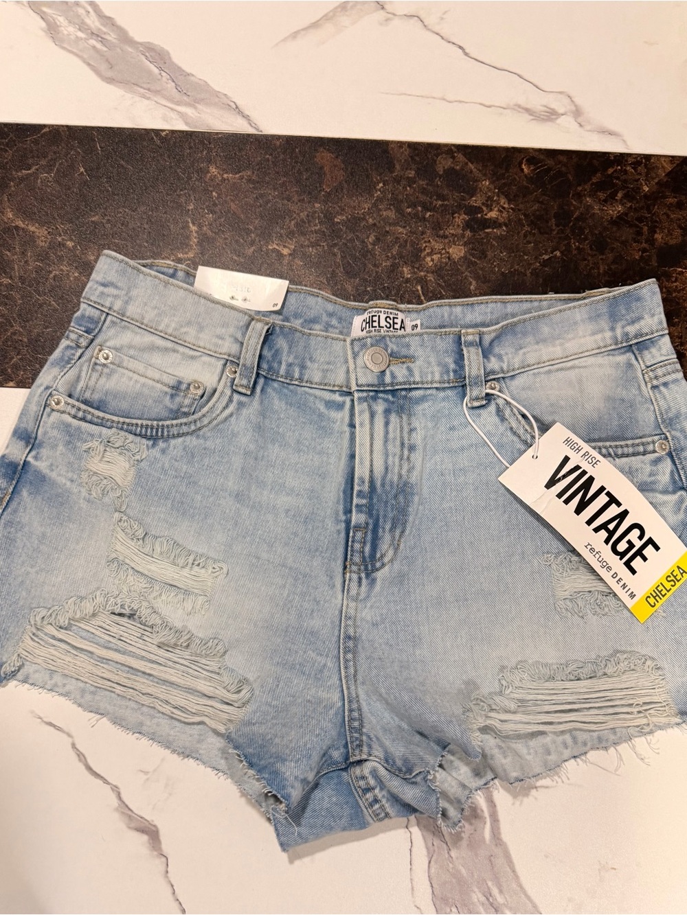 Chelsea High-Rise Light Blue Distressed Denim Shorts